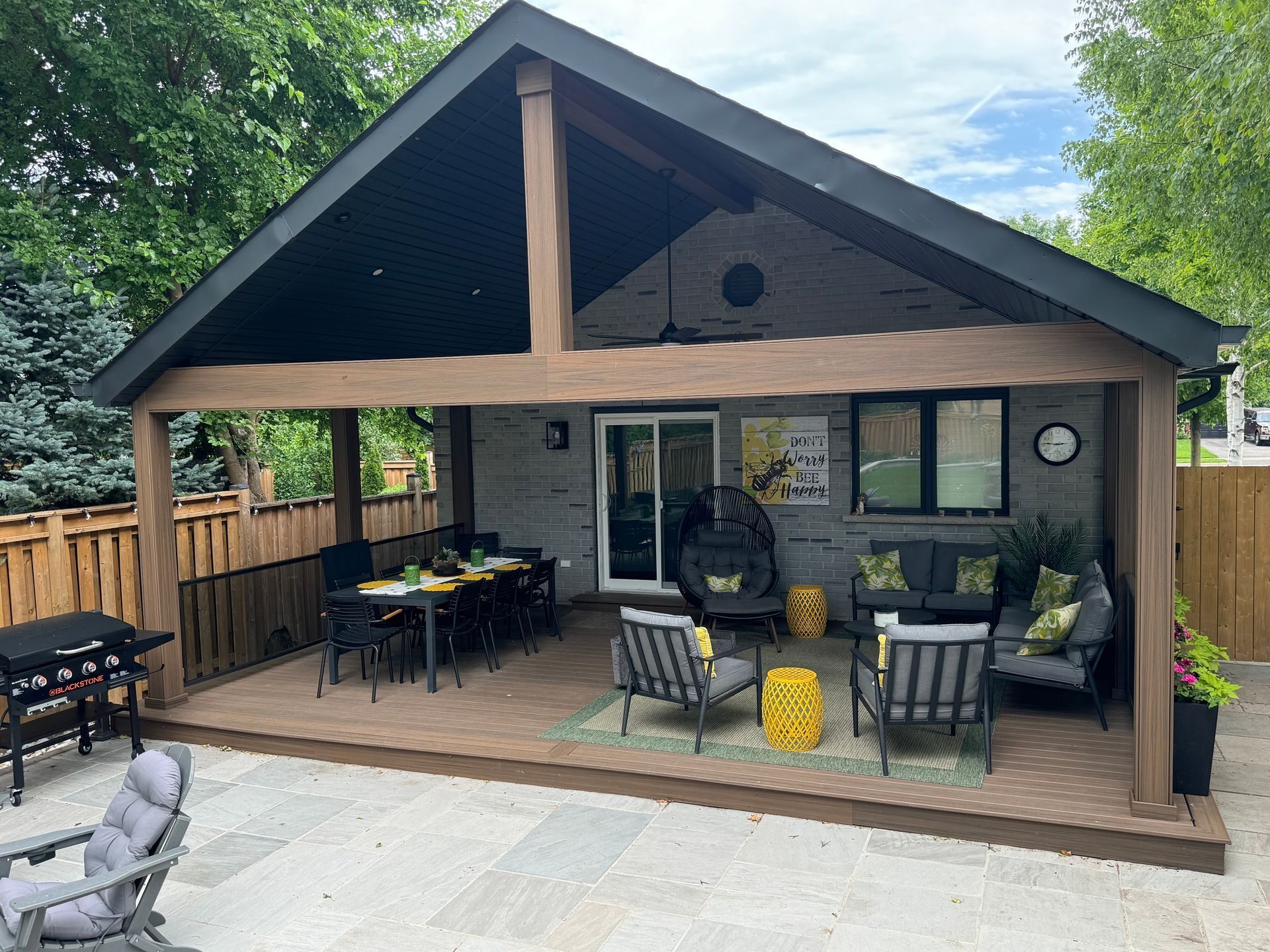 Covered outdoor pavilion with deck