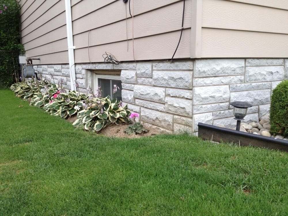 Stone foundation with landscaping