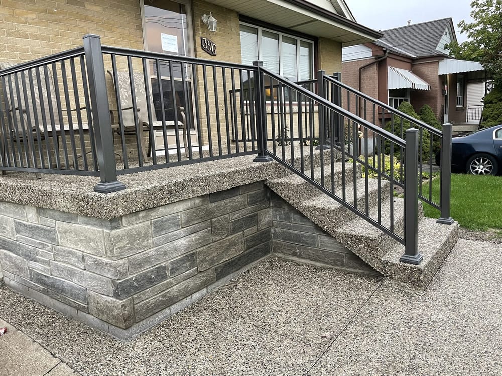 Exposed aggregate porch with block and railing