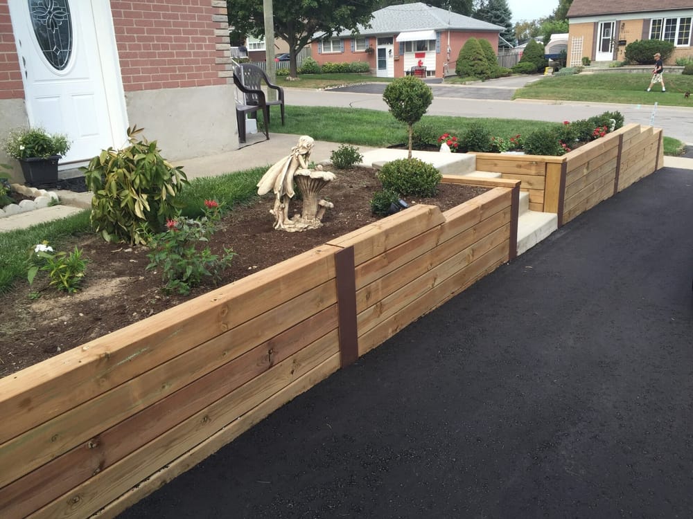 Cedar retaining wall with garden bed