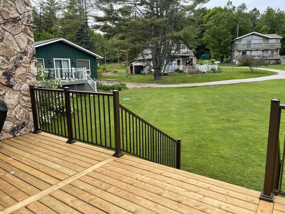 Lakeside cedar deck with scenic view