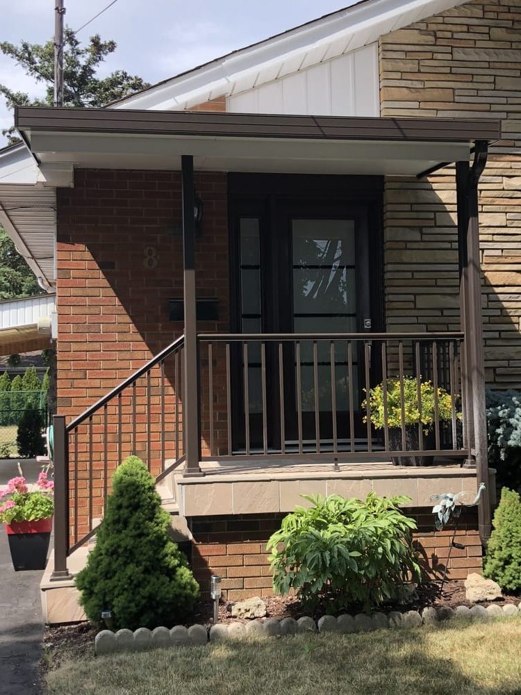Front porch with bronze railing