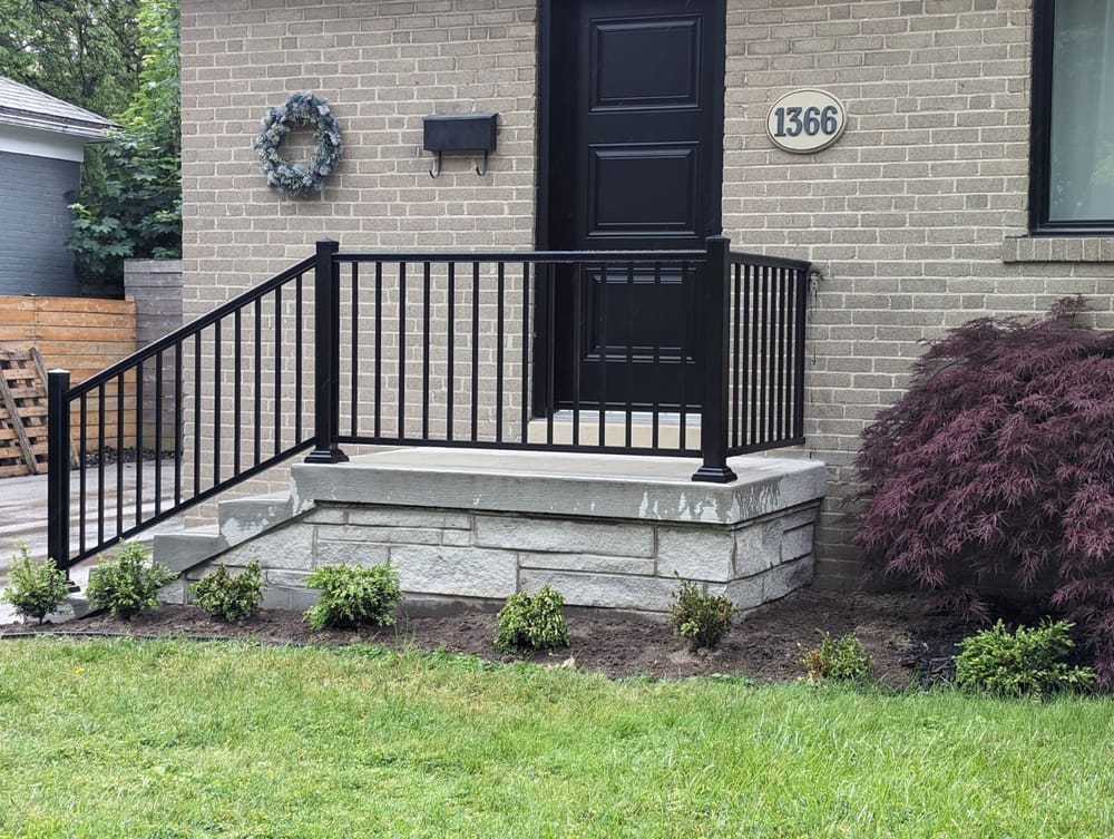 Black railing porch entry